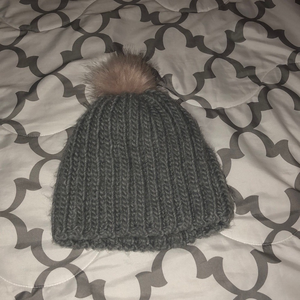 Grey wool hat with pink puff on top